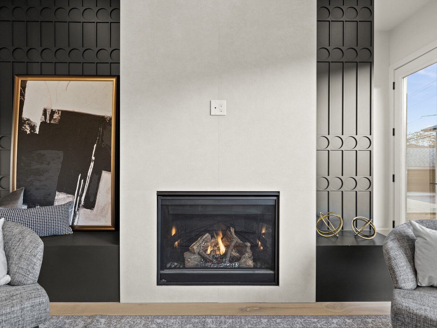Modern living room with custom fireplace feature